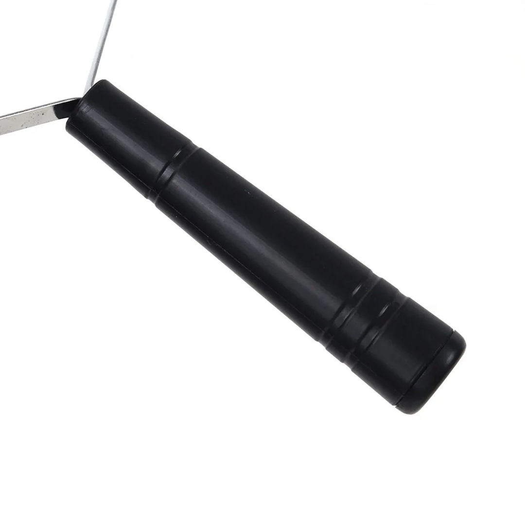 Black cylindrical object with a metallic blade on a white background, Pet Hair Remover