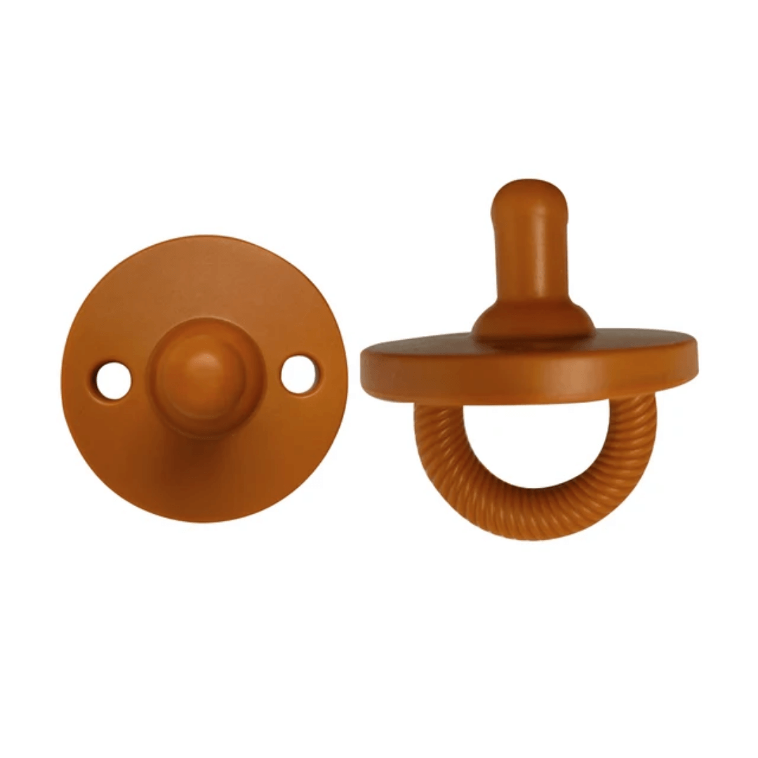 Two gray pacifiers on a white background. Itzy Silicone Pacifiers