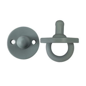 Two gray pacifiers on a white background