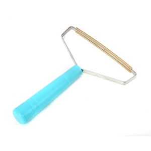 Textile roller with blue handle and metal frame on a white background